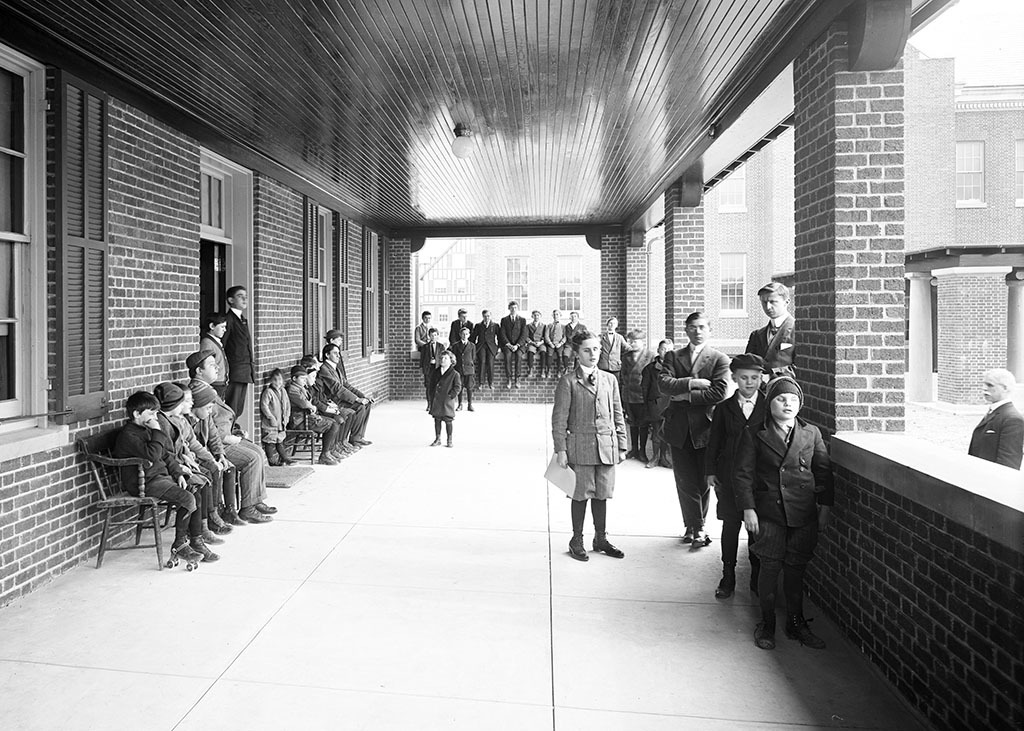 Boys on a porch at the Maryland School for the Blind