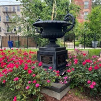 Memorial urn surrounded by flowers