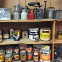 Shelf of vintage products, Budeke's Paint